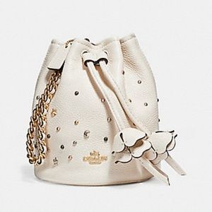 PETAL WRISTLET WITH STARDUST STUDS (COACH F24002)